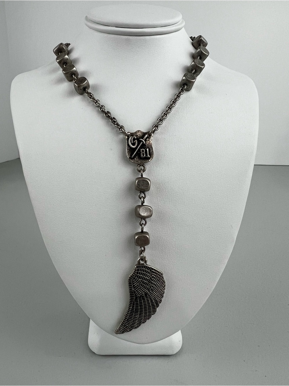 GUESS Antiqued Silver Beaded Rosary Wing Necklace